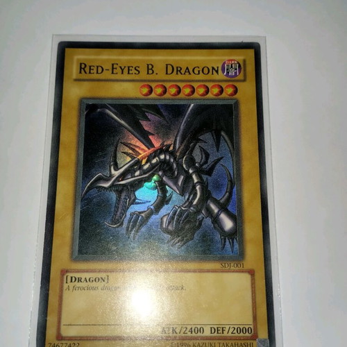 yugioh cards red eyes b dragon Amazon.com: Red-Eyes Black Dragon - MAGO-EN003 - Premium Gold Rare