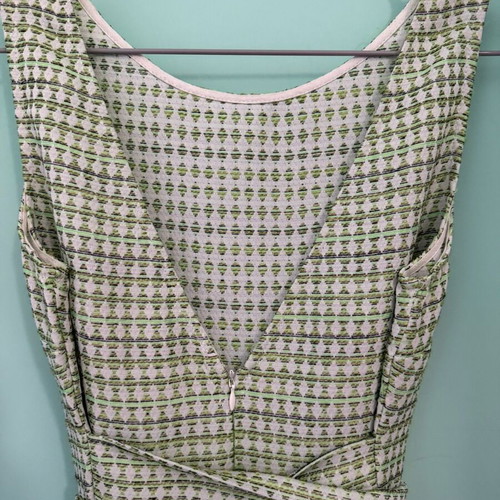 BO2 sleeveless A-line dress with green geometric brocade pattern