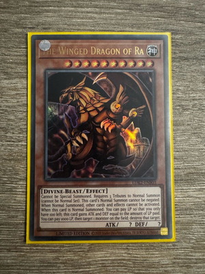 The Winged Dragon of Ra YuGiOh card in perfect condition