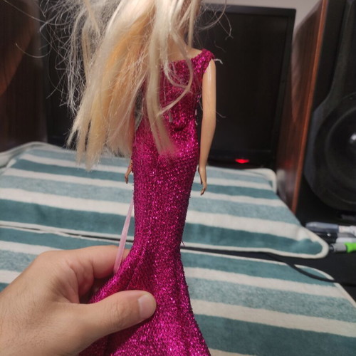 Doll with formal dress used, good condition