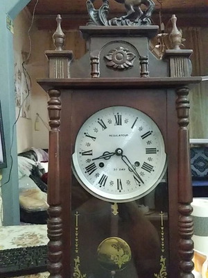 Antique wall clock used, large, 31-day winding