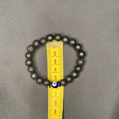 Unisex bracelet with evil eye and lava stone beads