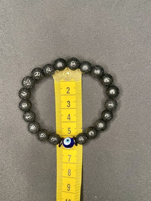 Unisex bracelet with evil eye and lava stone beads