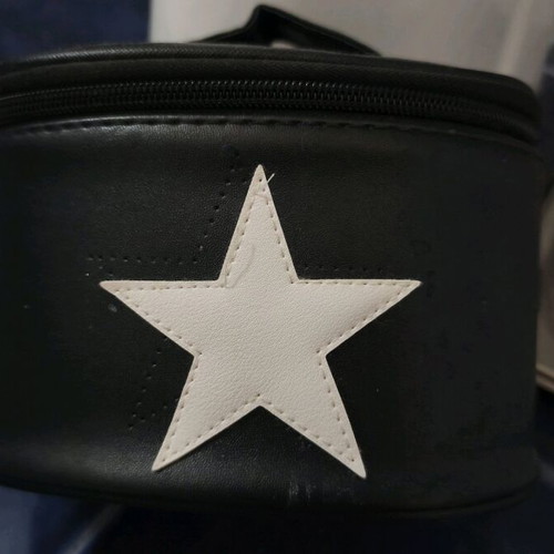 Black toiletry bag like new with zipper and star design