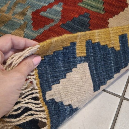 Handmade wool rug like new with beautiful colors