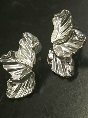 Earrings stainless steel silver color like new with petal design