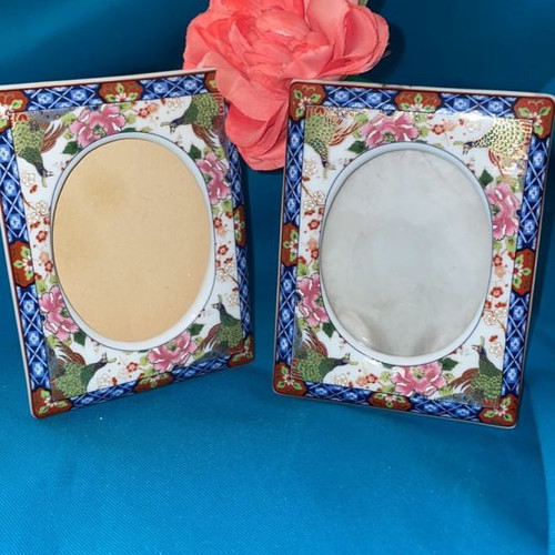 Porcelain painted frames used, set of 2 with flowers and peacocks