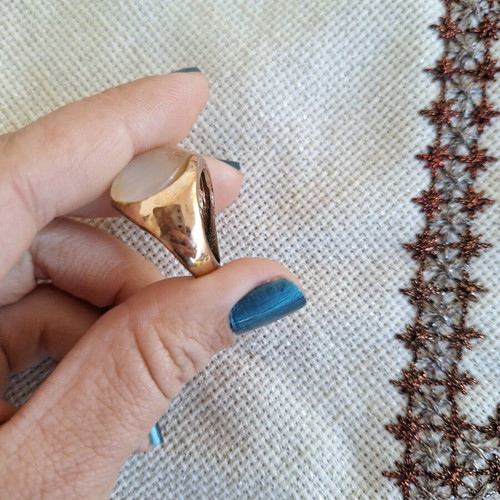 Ring with cat's eye stone size 18 used, metal and stone