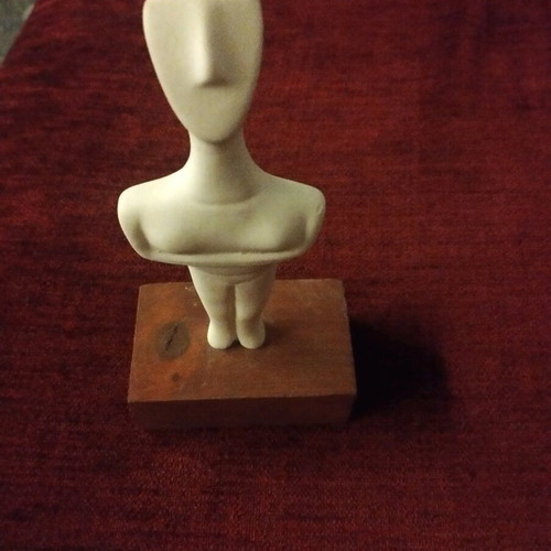 Cycladic figurine used, museum replica of female figure