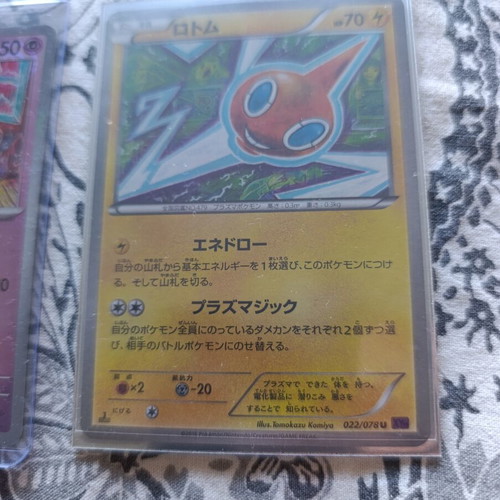 Japanese Pokemon TCG cards with 5 card stands