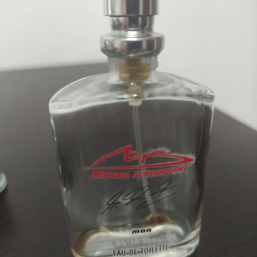 Empty Versace, Hugo Boss and Michael Schumacher perfume bottles used, collection pack