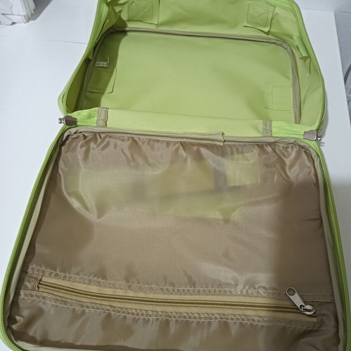 Travel toiletry bag used, green color, spacious