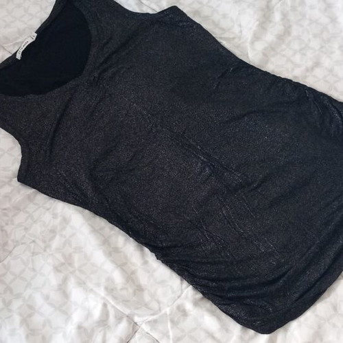 Sleeveless top, shiny elastic fabric. Size M/L