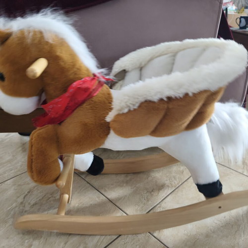 Rocking horse for children used with sounds