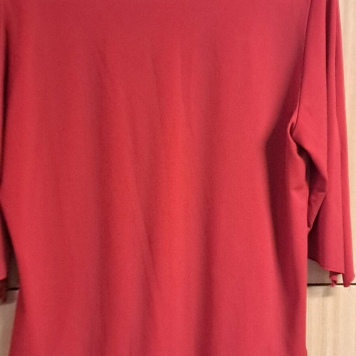 Women's elegant red blouse with black and white ribbon