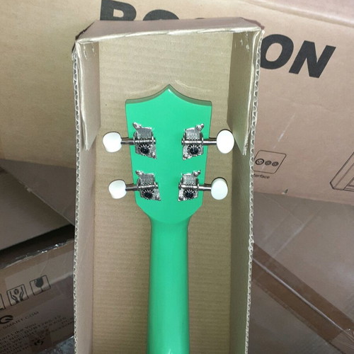 Ukulele new small elegant light green