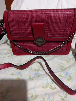 Red crossbody bag used with details