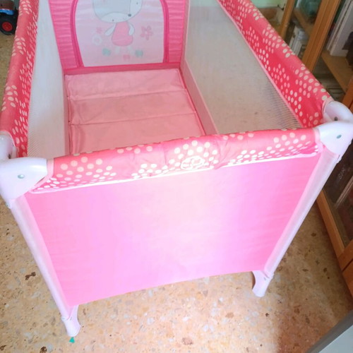 Pink baby playpen used