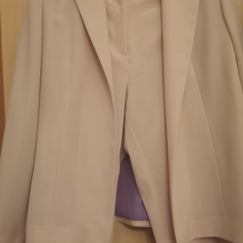 Ecru women's suit set like new, jacket size 40, pants size 42