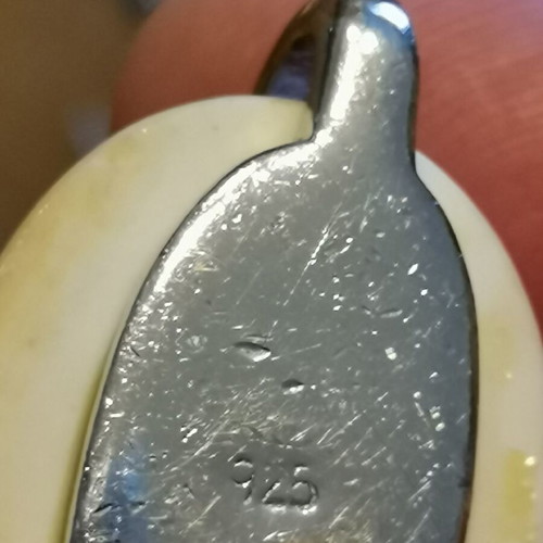 Silver 925 set with white stones used, possibly white coral