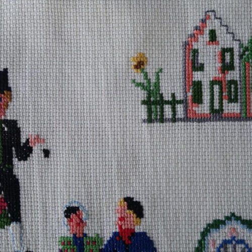 Embroidery with traditional costumes and Dutch scenes like new