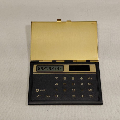 Agricultural Bank metal collectible case with calculator, used