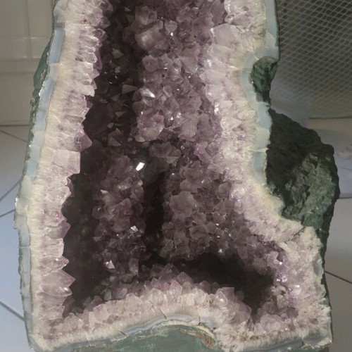 Amethyst Geode new with calcite crystal from Brazil