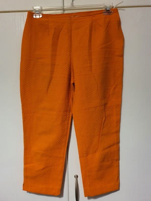Lynne orange pants with embossed pattern like new