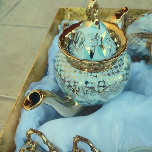 Porcelain tea and coffee set new, luxury with gold and floral details