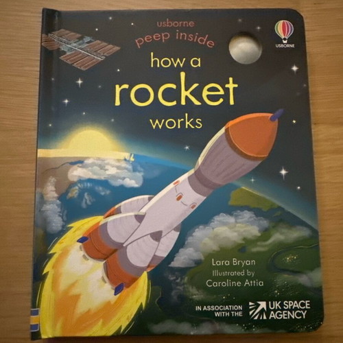 Usborne Peep Inside How a Rocket Works book like new in English