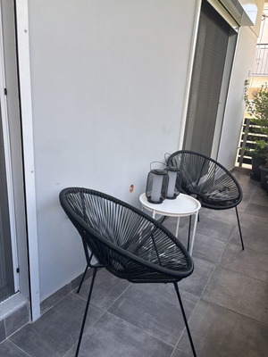 JYSK balcony set with 2 black chairs and white metal table like new