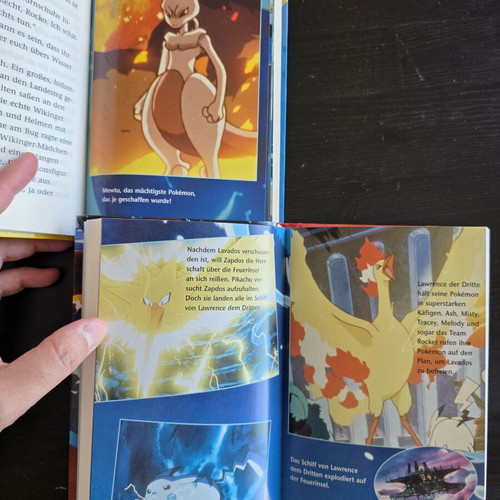 Pokémon collectible books 1st & 2nd movie German edition vintage 2000 like new