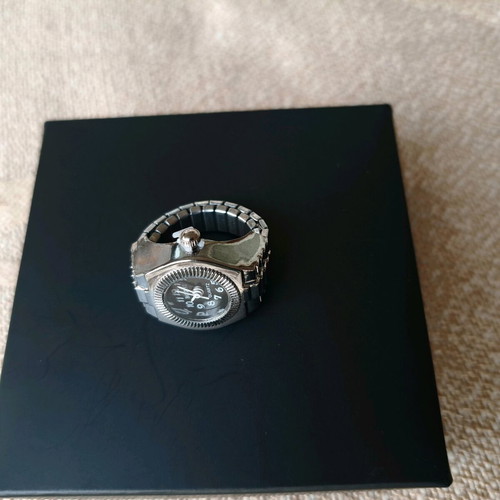 Ring watch quartz like new with black dial and silver bracelet