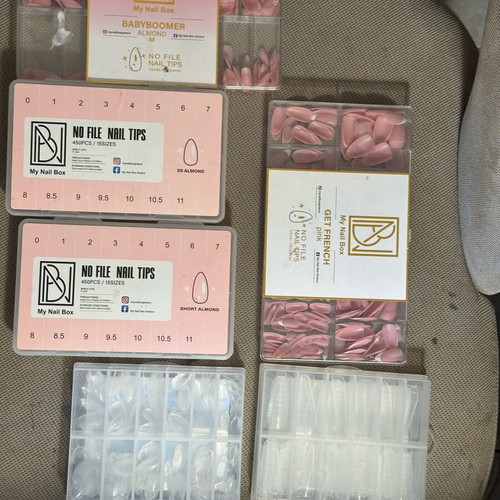 Nail products like new, 110 nail polishes, dual forms, gel tips, powders, rhinestones