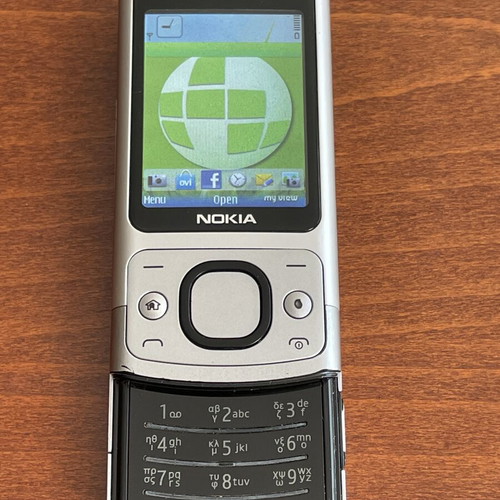 Nokia 6700s phone used with metal body and original battery
