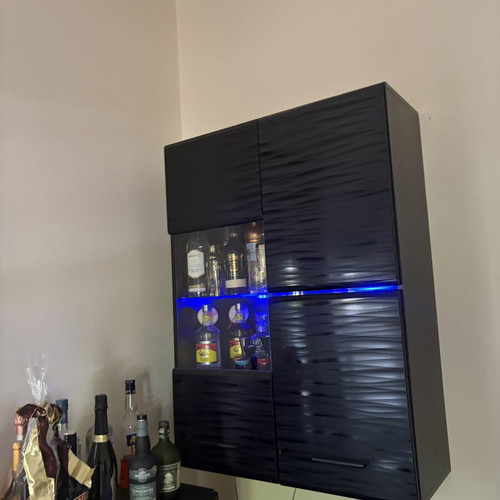 Living room unit with display cabinets and LED lighting
