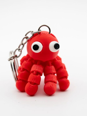 3D Printed Octopus Keychain with Articulated Legs new, blue and red