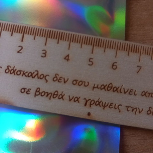 Wooden ruler with engraved phrase, new
