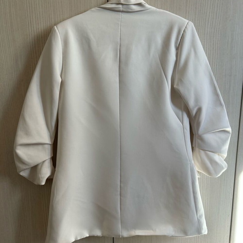 White blazer size S used with shoulder pads and ruched sleeves