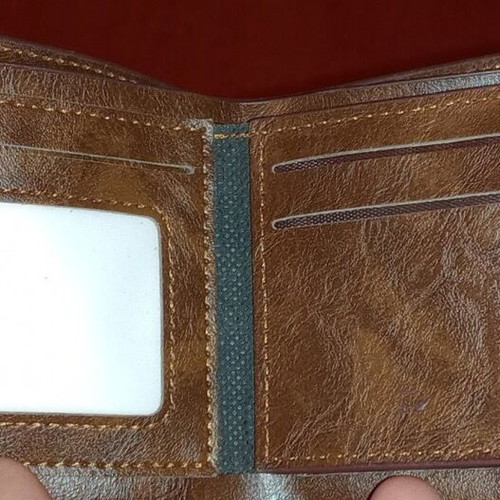Tommy men's leather wallet like new, brown