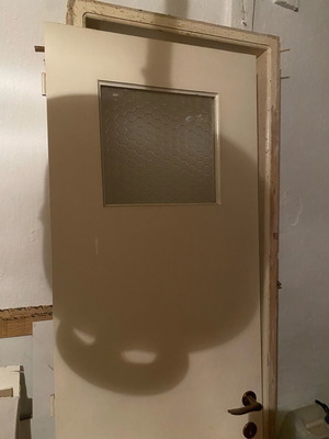 Ξύλινη πόρτα μεταχειρισμένη 62.5x206cm με τζάμι κυψέλης