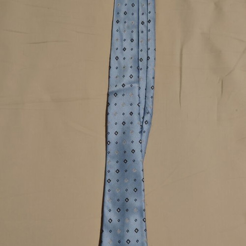 Children's tie light blue with diamond patterns like new