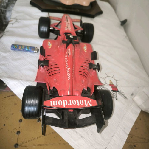 Formula 1 toy car with friction and sounds, red, like new