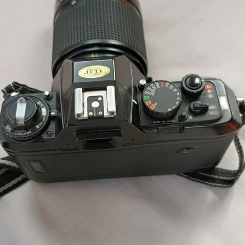 Nikon F301 camera used with 35-135 lens and flash