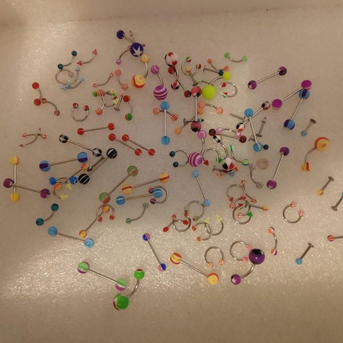 Piercing earrings set like new, 100 pieces, various designs and colors