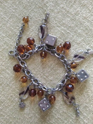 Bracelet with beads and dangling charms new, boho style