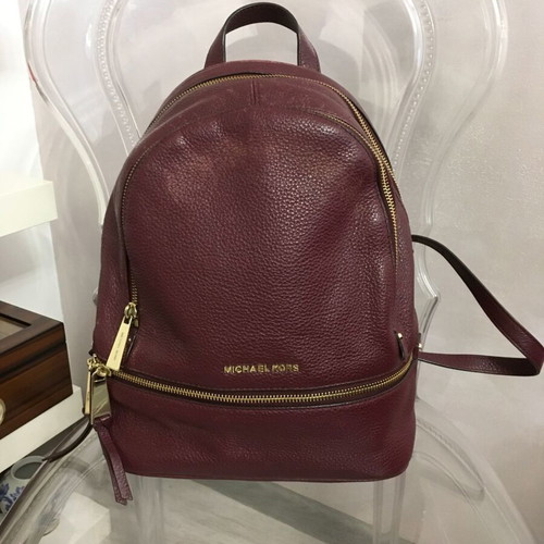 Michael Kors genuine leather backpack used, red