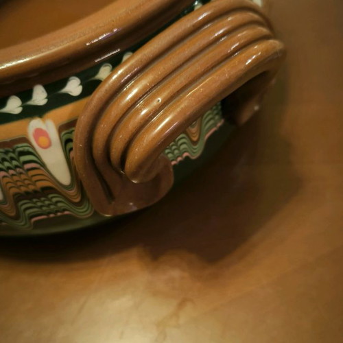 Hand-painted clay pot in excellent condition
