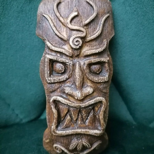 Handmade gypsum magnets and hanging totems painted with acrylics