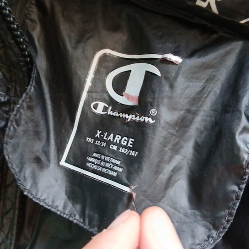 Champion jacket used, black with hood, size X-Large 13-14 years